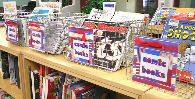 Comic books in baskets in a library; Photo CC BY Enokson via Flickr